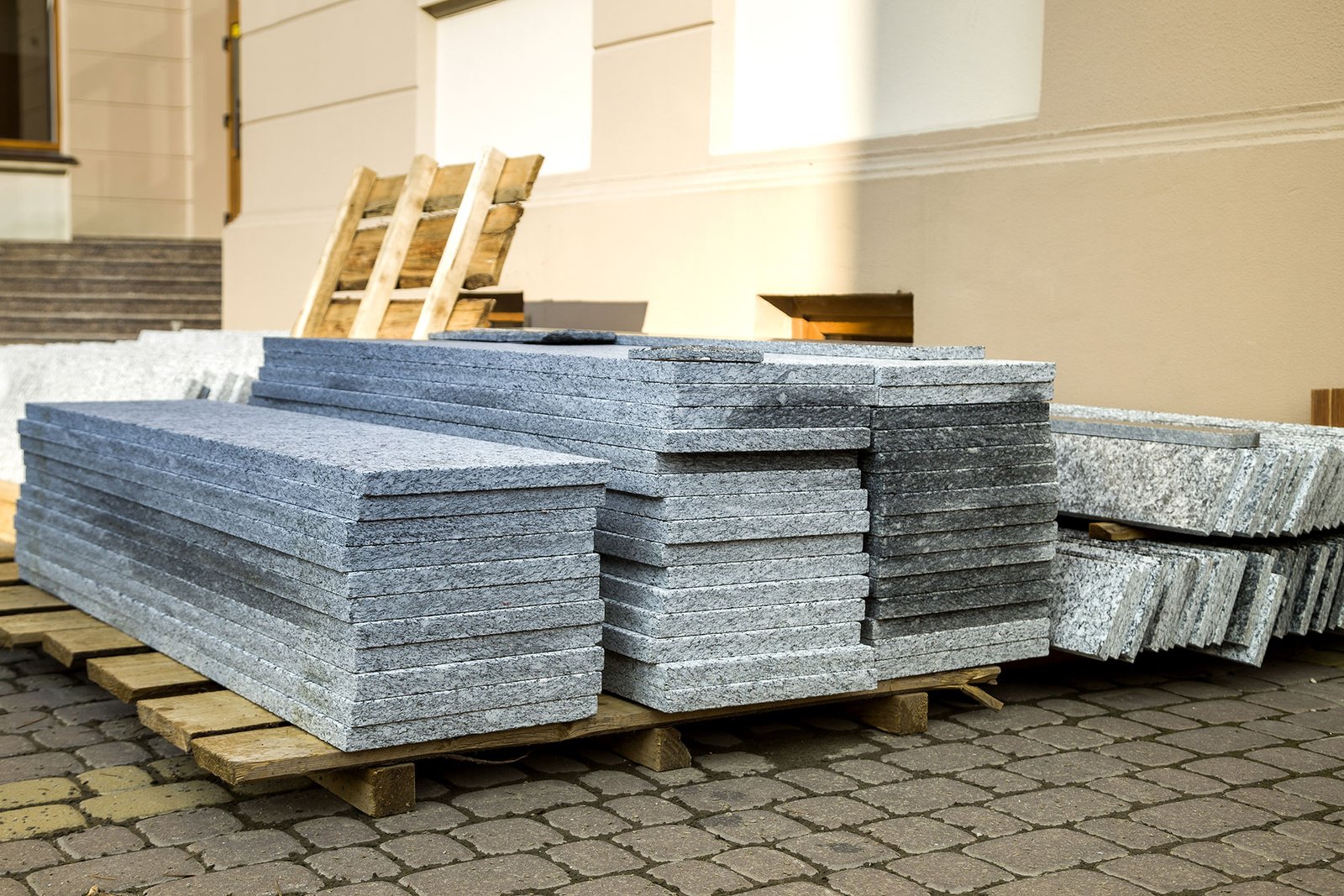 piles-of-granite-marble-slabs-stone-sheets-for-de-2022-03-16-00-15-09-utc.jpg